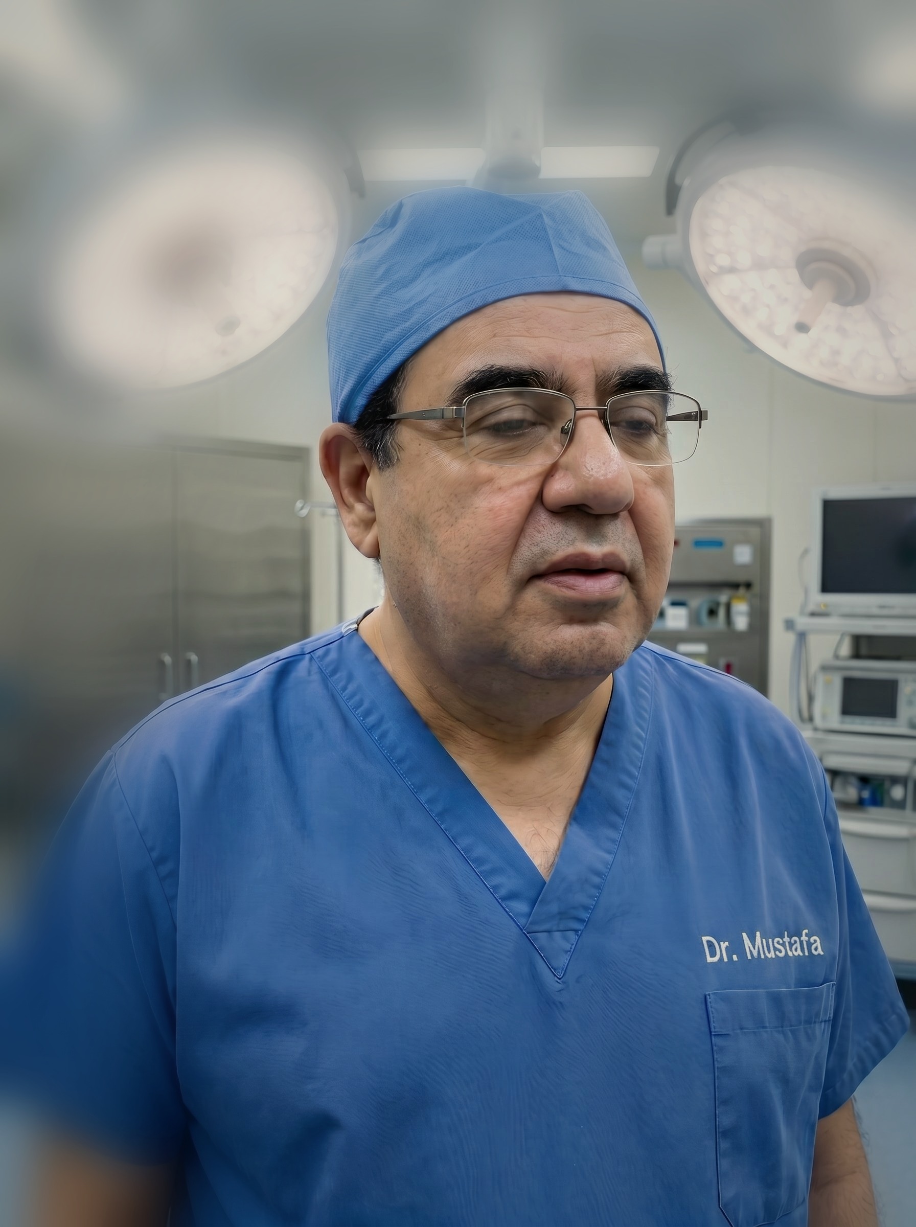 Dr. Mustafa R. Steityeh in surgical scrubs